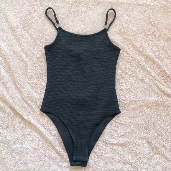 Topshop Tops - Topshop black bodysuit with ring detailing. Size 8.